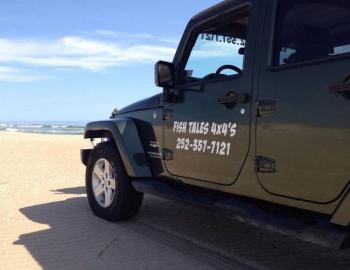 jeep on the beach in the outer banks